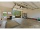 Three-car garage with workshop area, lake view and epoxy floor at 273 Leeward Point Loop # 14, Taylorsville, NC 28681