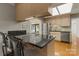 Kitchen features a breakfast bar, stainless steel appliances, and lots of natural light at 273 Leeward Point Loop # 14, Taylorsville, NC 28681