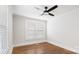 Airy bedroom with natural light from windows, hardwood floors, and a ceiling fan at 331 5Th Se Ave, Hickory, NC 28602