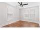 Bright, open bedroom with hardwood floors and a contemporary ceiling fan at 331 5Th Se Ave, Hickory, NC 28602