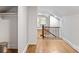 Bright bedroom with hardwood floors, closet space, and a classic banister at 331 5Th Se Ave, Hickory, NC 28602