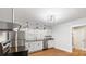 Clean, bright kitchen featuring stainless steel appliances, sleek cabinets, and modern lighting fixtures at 331 5Th Se Ave, Hickory, NC 28602