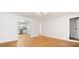 Spacious living room with hardwood floors, neutral walls, and an open layout to the kitchen at 331 5Th Se Ave, Hickory, NC 28602