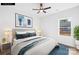 Tastefully decorated bedroom featuring a ceiling fan, large window and neutral decor at 404 S Greenbriar Rd, Statesville, NC 28625