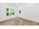 Bedroom featuring hardwood floors and a bright window and a closet at 404 S Greenbriar Rd, Statesville, NC 28625