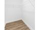 Walk-in closet with white shelving and neutral wall-to-wall carpeting at 404 S Greenbriar Rd, Statesville, NC 28625