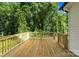 Spacious wooden deck overlooking a lush, green backyard at 404 S Greenbriar Rd, Statesville, NC 28625