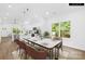 Elegant dining room with open floor plan, featuring modern furnishings and abundant natural light at 404 S Greenbriar Rd, Statesville, NC 28625