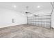 Spacious two car garage featuring concrete floors and an automatic garage door at 404 S Greenbriar Rd, Statesville, NC 28625