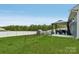 Expansive backyard featuring a modern gazebo, storage shed, and secure fencing at 4205 Jones Creek Ln, Charlotte, NC 28215