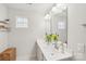 Bathroom showcasing a double sink vanity and neutral walls at 4205 Jones Creek Ln, Charlotte, NC 28215