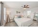 Bright bedroom featuring a ceiling fan, neutral walls, and plush carpet at 4205 Jones Creek Ln, Charlotte, NC 28215