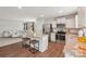 Modern kitchen with stainless steel appliances, granite countertops, and central island at 4205 Jones Creek Ln, Charlotte, NC 28215