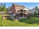 Exterior view of a backyard with deck, patio and mature trees at 444 Snapdragon Dr, Clover, SC 29710