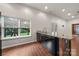 Open kitchenette area with stone countertops, sink, and a view to the back yard at 444 Snapdragon Dr, Clover, SC 29710
