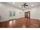 Living room with tile floors, double glass doors leading to the backyard at 444 Snapdragon Dr, Clover, SC 29710