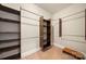 Spacious walk-in closet featuring built-in shelving and multiple hanging rods at 444 Snapdragon Dr, Clover, SC 29710