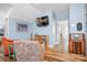 Comfortable bonus room with plush seating, a TV, and built-in shelving, perfect for relaxing or entertaining guests at 4902 Looking Glass Trl, Denver, NC 28037