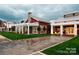 Spacious community clubhouse with manicured landscaping and inviting entrance at 4902 Looking Glass Trl, Denver, NC 28037