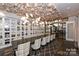 Elegant dining room with wine storage and unique ceiling feature at 4902 Looking Glass Trl, Denver, NC 28037