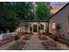 Picturesque courtyard featuring manicured landscape and an arched walkway at 5030 Hardison Rd, Charlotte, NC 28226