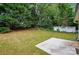 Lush backyard featuring a large green space and mature shade trees at 519 Jacobs Rdg, Fort Mill, SC 29715