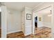 Open-concept foyer with wood floors and access to the dining room at 616 Trailing Rock Dr, Charlotte, NC 28214