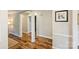 Inviting foyer with wood floors, neutral walls, and views to other rooms in the home at 616 Trailing Rock Dr, Charlotte, NC 28214