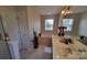 Bright bathroom with a tub, shower, double vanity and large mirror at 6454 Sain Milling Rd, Vale, NC 28168