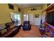 Comfortable living room with hardwood floors, providing access to the dining and entryway at 6454 Sain Milling Rd, Vale, NC 28168