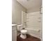 Bathroom featuring a tub and shower combo with shelving at 7401 Kinsmore Ln, Charlotte, NC 28269