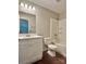 Bathroom with stylish vanity, tub and shower combination at 7401 Kinsmore Ln, Charlotte, NC 28269