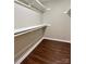 Bright closet with wood floors and shelving at 7401 Kinsmore Ln, Charlotte, NC 28269
