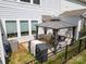 Overhead view of backyard featuring a gazebo, outdoor seating, BBQ, privacy fence, and lawn at 8107 Houser St, Cornelius, NC 28031