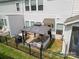 Overhead view of a cozy backyard featuring a patio with a gazebo, grill, and lawn at 8107 Houser St, Cornelius, NC 28031
