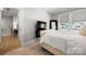 Bedroom featuring a queen bed and a large window at 8107 Houser St, Cornelius, NC 28031