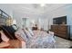 Inviting bedroom featuring a comfortable bed, with stylish furniture and a serene ambiance for restful nights at 8473 Bing Cherry Dr, Denver, NC 28037