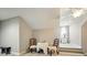 Bonus room featuring a table and chairs with a view to a well-lit area with a dresser at 8473 Bing Cherry Dr, Denver, NC 28037