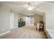 Bonus room featuring a dresser and a table and chairs with a view of two doors at 8473 Bing Cherry Dr, Denver, NC 28037