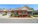 Charming brick home with well-manicured landscaping and an attached two car garage at 8473 Bing Cherry Dr, Denver, NC 28037