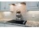 Kitchen featuring smooth cooktop and granite countertops at 8473 Bing Cherry Dr, Denver, NC 28037