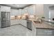 Kitchen with stainless steel appliances, granite counters, and tile backsplash at 8473 Bing Cherry Dr, Denver, NC 28037