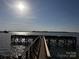 Scenic view of the lake with a dock on a sunny day at 8473 Bing Cherry Dr, Denver, NC 28037