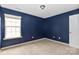 Bedroom featuring a window for natural light and a neutral carpet at 10417 Ebbets Rd, Charlotte, NC 28273