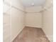 Walk-in closet with wire shelving, offering ample storage and organization space at 10417 Ebbets Rd, Charlotte, NC 28273
