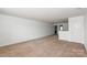 Spacious living room with neutral carpet flooring, ready for customization at 10417 Ebbets Rd, Charlotte, NC 28273