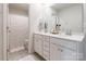 Bathroom featuring double vanity with white cabinets and a shower with curtain at 115 Haddonsfield Dr, Mooresville, NC 28115