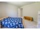 Bright bedroom featuring a large window, storage, and a closet at 115 Haddonsfield Dr, Mooresville, NC 28115