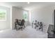 Bedroom with ample natural light with a desk, and an electronic drum set at 115 Haddonsfield Dr, Mooresville, NC 28115