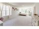 Spacious bedroom with bright natural light and neutral walls, and plush carpet at 115 Haddonsfield Dr, Mooresville, NC 28115